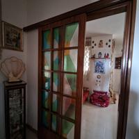 Porta con binario scorrevole