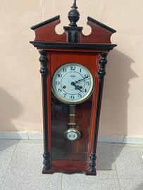 Orologio da muro con pendolo