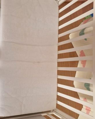 Culla in legno con sponda rimovibile e cassetto