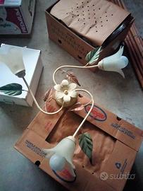 Tris di lampadari in ferro battuto