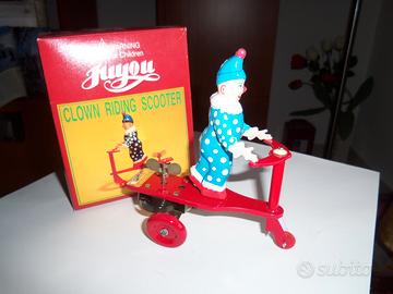 Latta--CLOWN su scooter con carica a molla-MB-