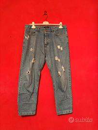 Jeans strappati