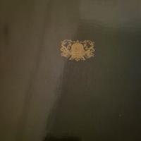 servizio da 12 sottopiatti acciaio  sherattonn