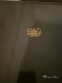 servizio da 12 sottopiatti acciaio  sherattonn