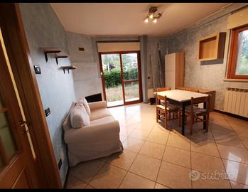 Bilocale con giardino privato