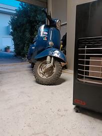 Vespa special 50 faro tondo