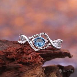 Anello Huitan - Pietra Blu e Zirconi