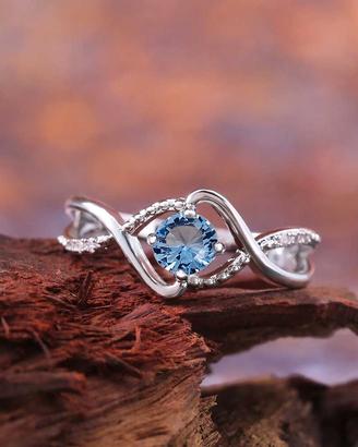 Anello Huitan - Pietra Blu e Zirconi