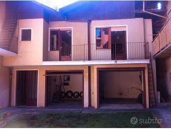 Casa con 2 box e posto auto