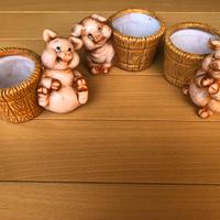 Piccoli vasetti con  maialini