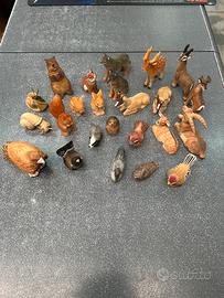 Lotto oltre 20 animali in legno artigianali