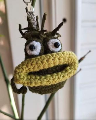 Scimmia di peluche con viso lavorato a mano in mat