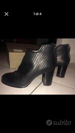 Tronchetti neri vera pelle