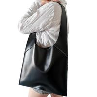 Borsa in vera pelle nero palmellata