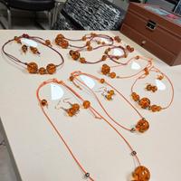 Collezione Bigiotteria ''TRAMONTO-SFERE DI AMBRA''