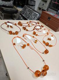 Collezione Bigiotteria ''TRAMONTO-SFERE DI AMBRA''