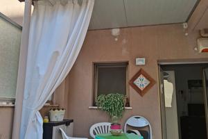 Monovano arredato e corredato con grande terrazzo