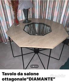 Tavolo con base in ferro e piano in marmo