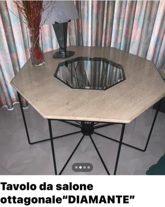 Tavolo con base in ferro e piano in marmo
