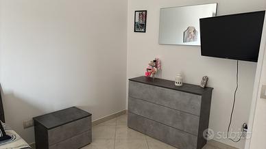 Camera da letto parete attrezzata