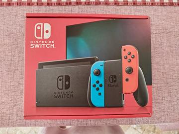 Nintendo Switch + 4 giochi + MicroSD 256 GB