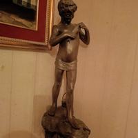 statua 