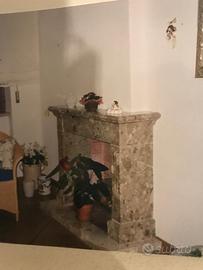 Camino in marmo brecciato/ pietra Favara