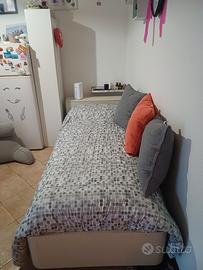 letto con testiera contenitore con materasso