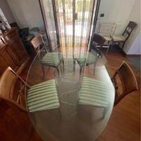 tavolo ovale in cristallo