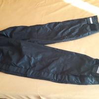 Copripantaloni  impermeabili mai usati.