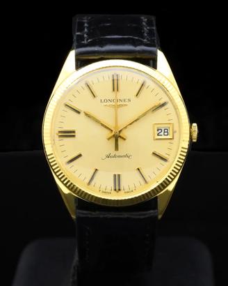 Longines Date 70s 18 kt gold automatic cal 506