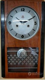 Orologio da parete a pendolo anni 50.