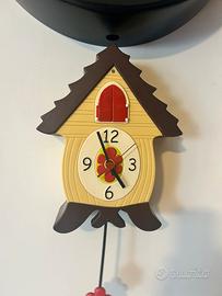 Orologio a cucù con cane e pendolo xanadoo,