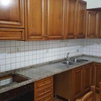 Cucina angolare in rovere anticato e granito