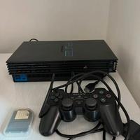 Playstation 2 con 1 joystick, memory card e giochi