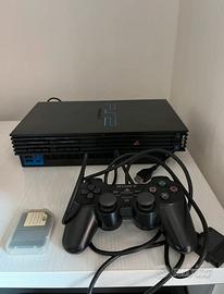 Playstation 2 con 1 joystick, memory card e giochi