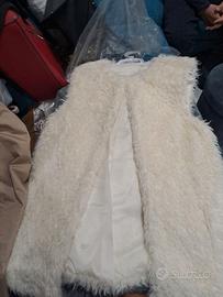 Cardigan smanicato in pelliccia panna