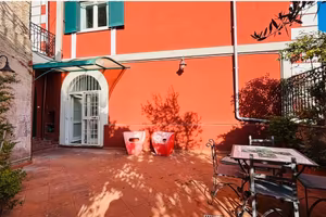 Appartamento con giardino privato e 2 posti auto