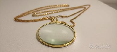 Ciondolo con lente d'ingrandimento