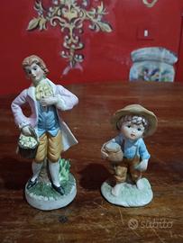 Coppia Statuine in Ceramica