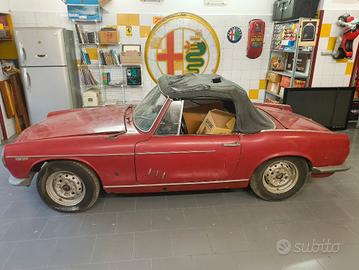 InnocentiSpider 1100 Ghia 1963 - Targa e libretto.