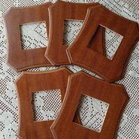 Cornici per interruttori elettrici in legno 