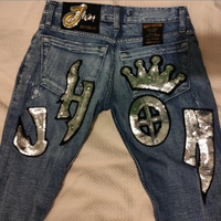 Jeans chiaro con paillettes argentate