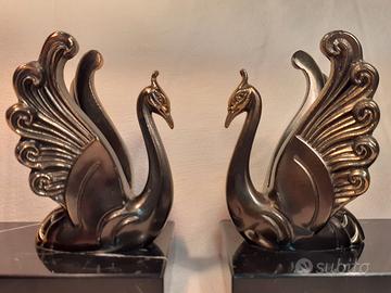 Coppia reggilibri con cigni metallo e marmo
