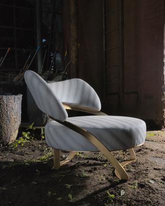 Poltrona imbottita in ottone – Liquidazione