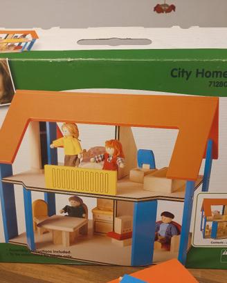 Casa per bambole in legno Plan Toys