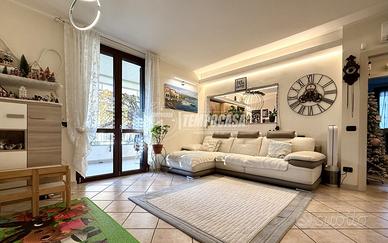 APPARTAMENTO SU DUE LIVELLI CON GIARDINO E BOX DOP