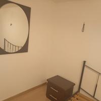 Comò,comodini,rete e specchio.