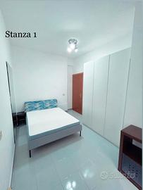 Stanza singola arredata