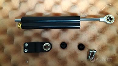 Ammortizzatore di sterzo universale